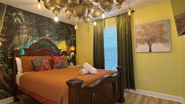 bedroom featuring light wood-type flooring