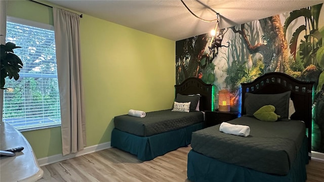 bedroom featuring wood-type flooring