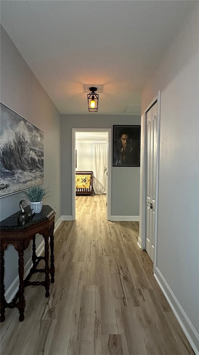 hallway featuring light wood-type flooring