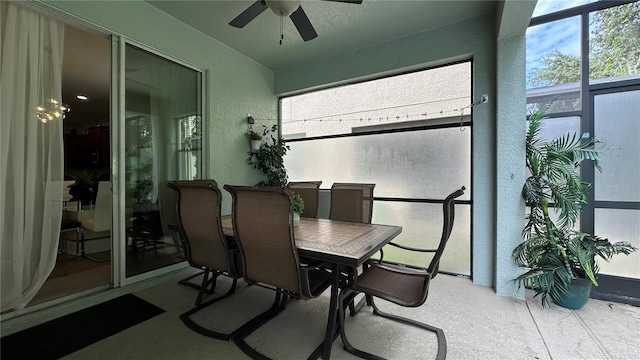 sunroom / solarium with ceiling fan