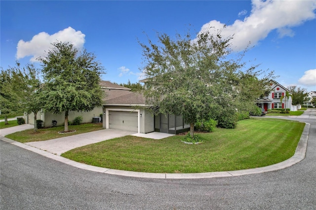 view of property hidden behind natural elements featuring a front yard, a garage, and central air condition unit