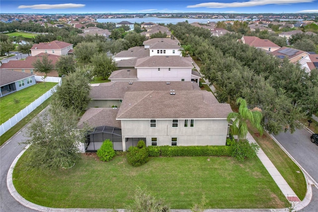 drone / aerial view with a water view