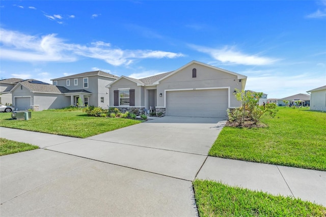 view of front facade with a front lawn and a garage