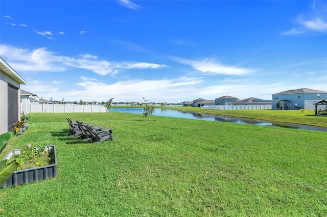 view of yard with a water view