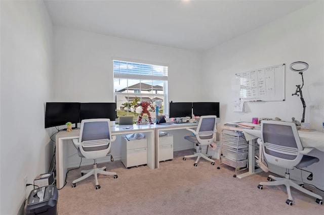 home office with light colored carpet