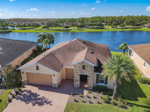 birds eye view of property featuring a water view