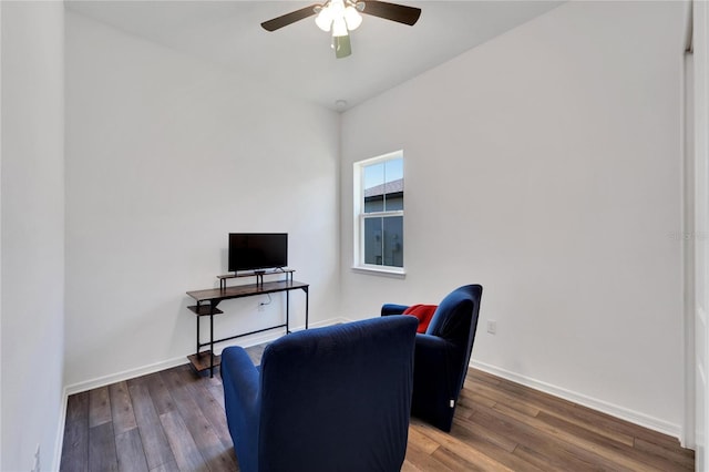 interior space featuring ceiling fan and dark wood-type flooring