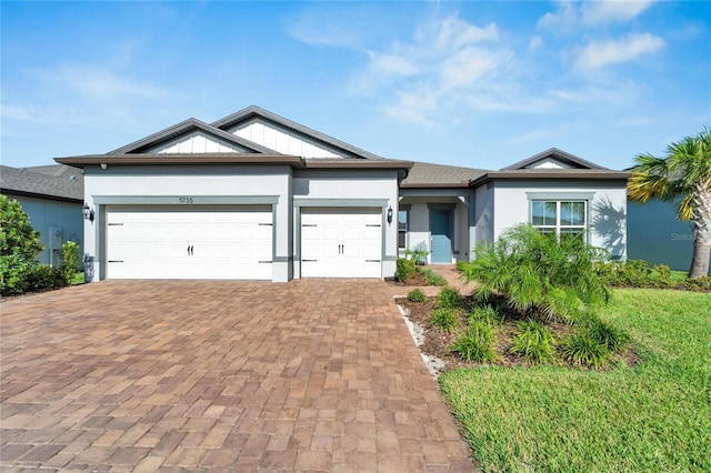 view of front of home with a garage