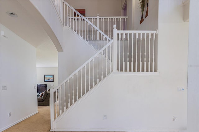 stairs with carpet floors