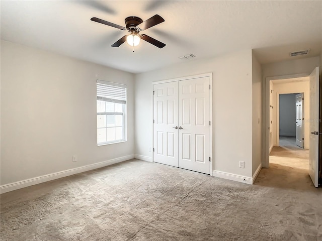 unfurnished bedroom featuring a closet and ceiling fan