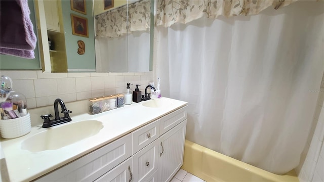 bathroom with vanity, shower / tub combo, tile patterned flooring, and tasteful backsplash