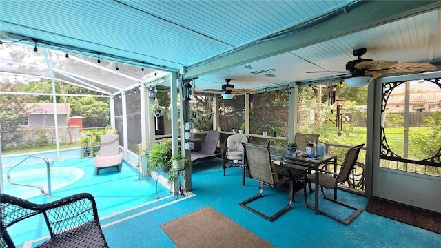 sunroom / solarium with ceiling fan