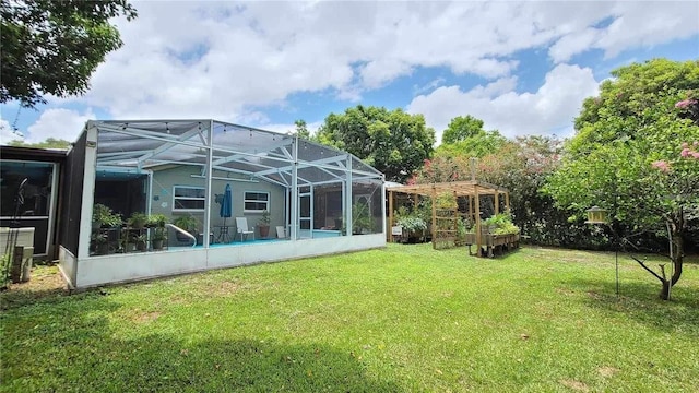 view of yard featuring glass enclosure