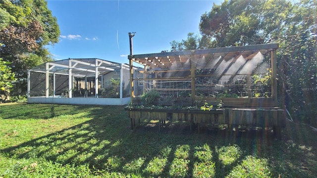 view of yard with a lanai