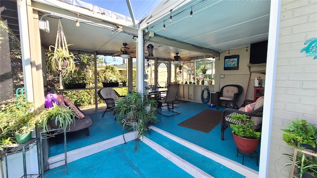 view of patio / terrace featuring ceiling fan