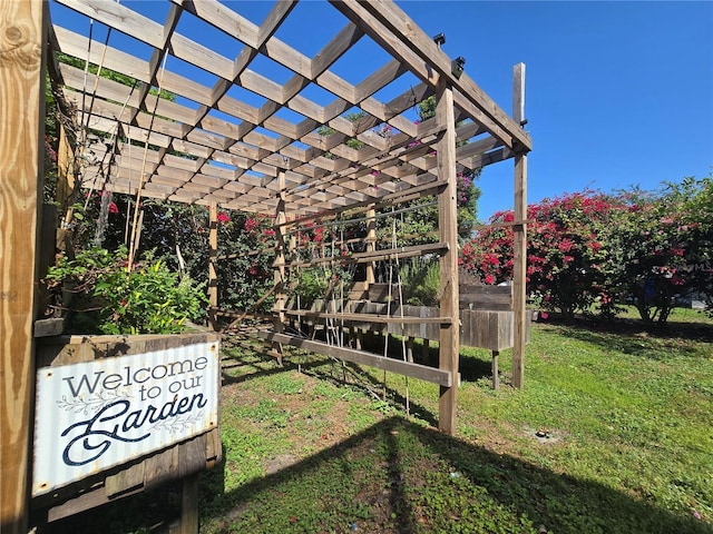 112 10th St, Saint Cloud, FL 34769 - view of grassy yard with a pergola