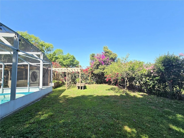 112 10th St, Saint Cloud, FL 34769 - view of green lawn featuring an outdoor pool and a lanai