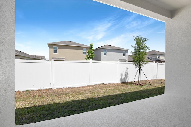 view of yard featuring a patio and a fenced backyard