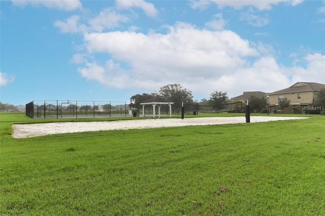 surrounding community with a gazebo, a yard, and volleyball court