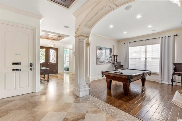 rec room featuring crown molding, light hardwood / wood-style floors, a healthy amount of sunlight, and billiards