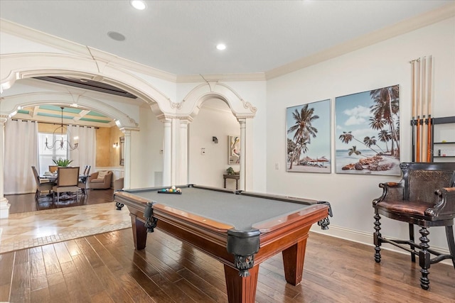 playroom featuring ornamental molding, wood-type flooring, and decorative columns