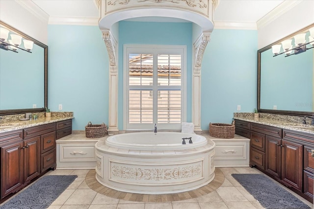 bathroom with vanity, crown molding, and a relaxing tiled tub