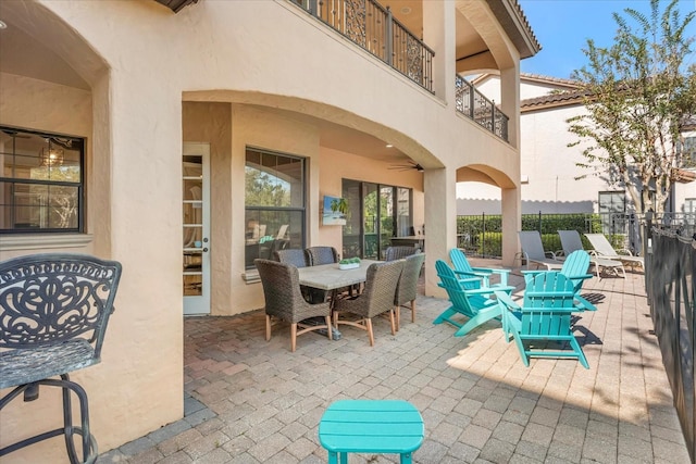 view of patio / terrace with a balcony