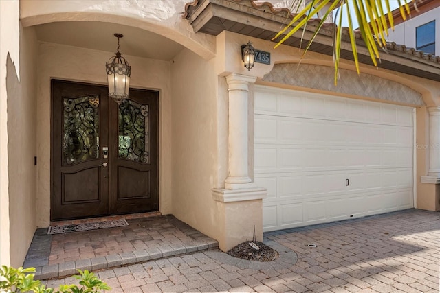 entrance to property featuring a garage