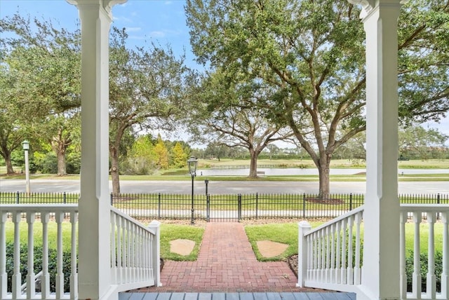 view of patio / terrace with a water view