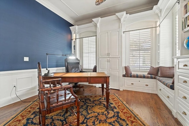 office space featuring ornamental molding and dark hardwood / wood-style flooring