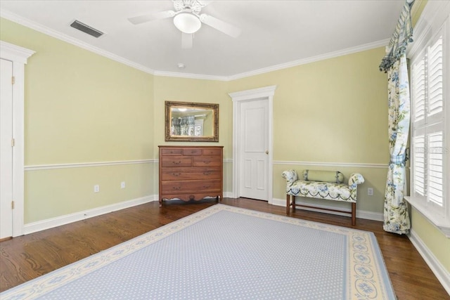 sitting room with ornamental molding, hardwood / wood-style floors, ceiling fan, and plenty of natural light