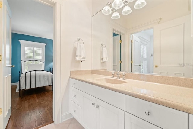 bathroom with vanity and hardwood / wood-style floors