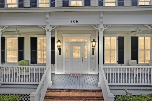 property entrance with a porch and ceiling fan