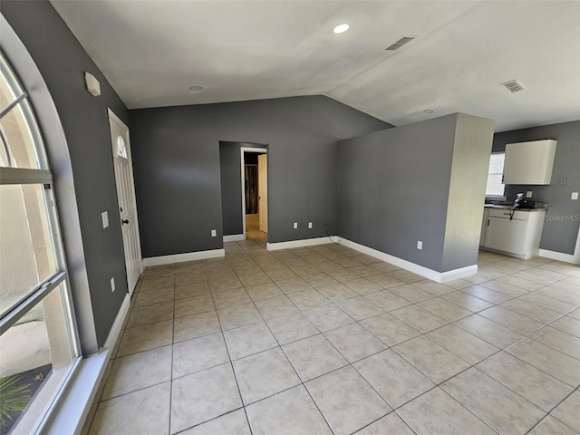 interior space featuring vaulted ceiling