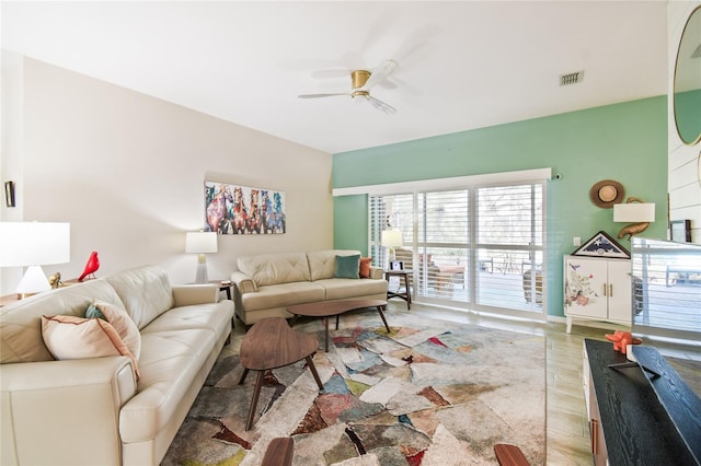 living room featuring ceiling fan