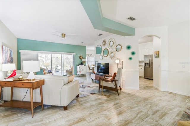 living room with ceiling fan