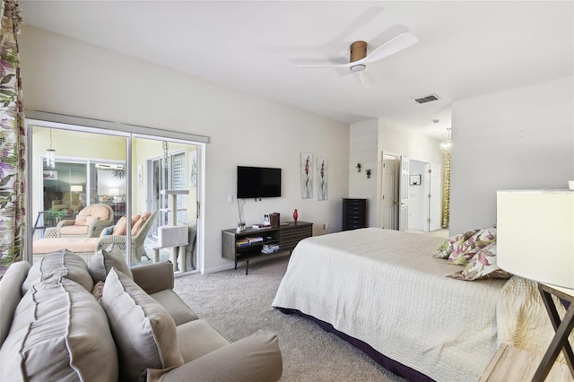 carpeted bedroom featuring ceiling fan and access to exterior