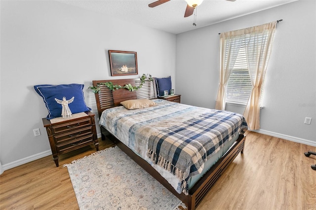 12213 Still Meadow Dr, Clermont, FL 34711 - bedroom with light wood-type flooring and a ceiling fan