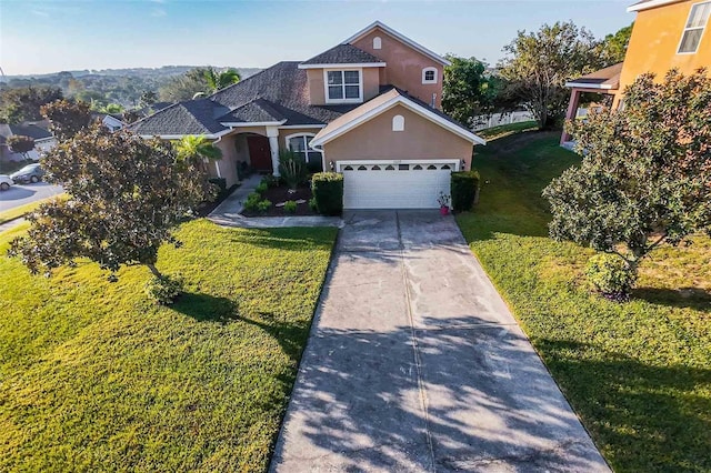 12213 Still Meadow Dr, Clermont, FL 34711 - traditional-style home featuring stucco siding, driveway, a front yard, and an attached garage