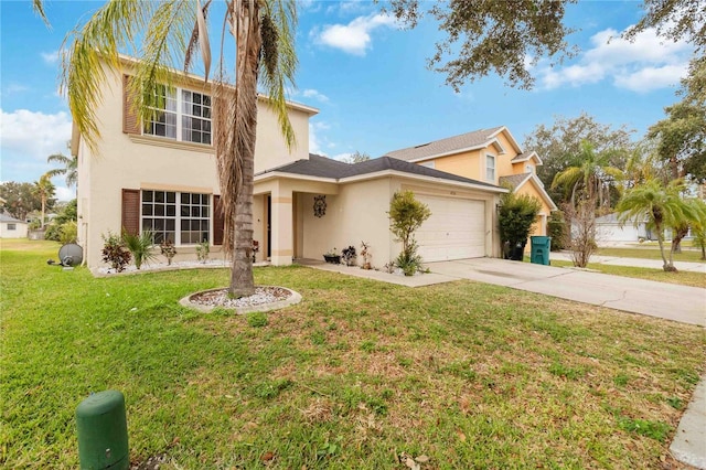 view of front of home featuring a front lawn and a garage