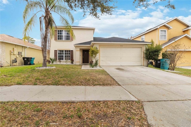 view of front facade featuring a front yard and a garage