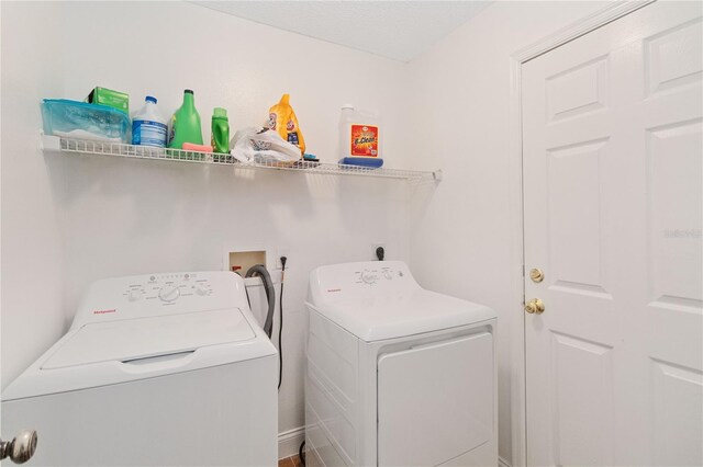 laundry area featuring independent washer and dryer