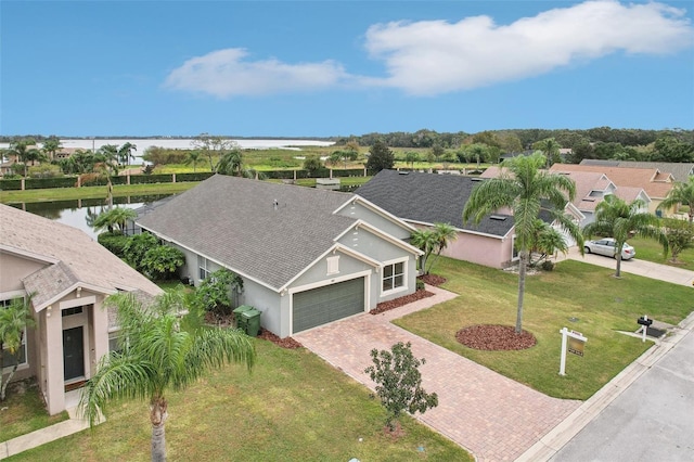 bird's eye view with a water view