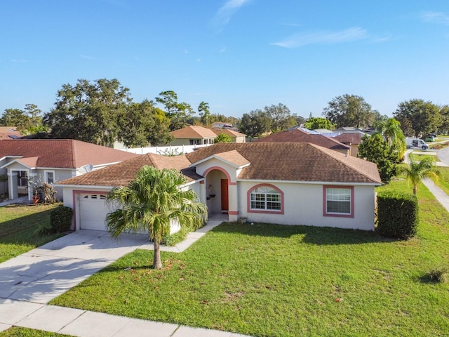 view of front of house with a front lawn and a garage