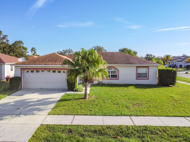 single story home with a front yard and a garage