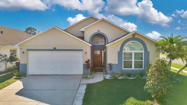 view of front facade with a front lawn and a garage