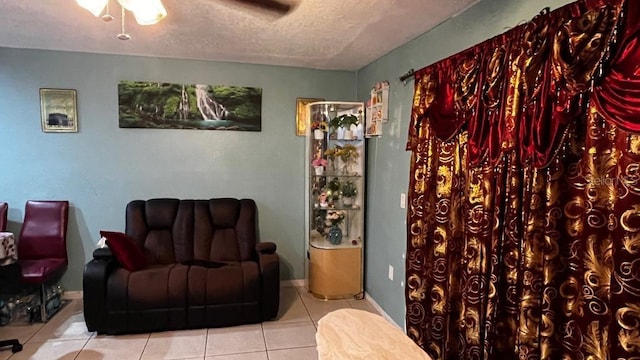 2440 Summerfield Way, Kissimmee, FL 34741 - living area with tile patterned flooring and a textured ceiling