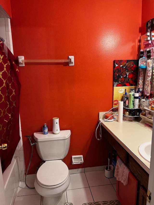 full bathroom with toilet, shower / bath combo with shower curtain, vanity, and tile patterned floors