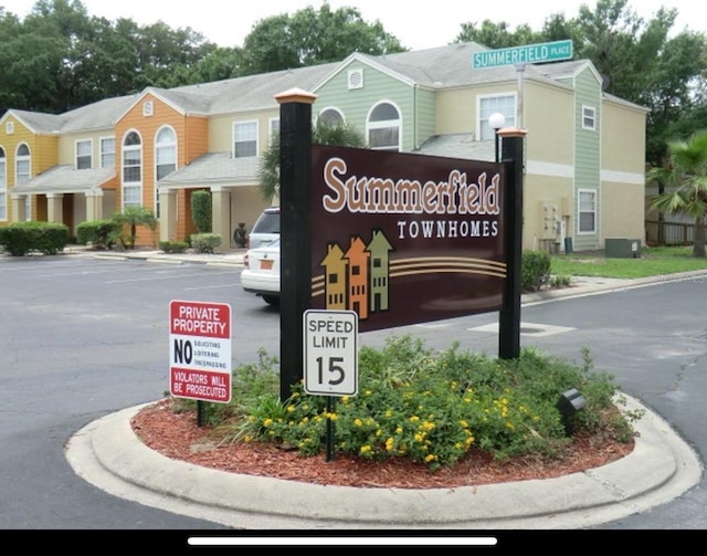 view of community sign