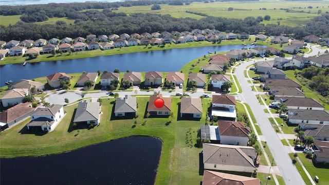 drone / aerial view featuring a water view